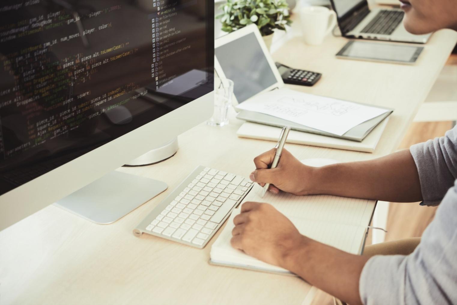Modern workspace with design tools for mobile game UI development